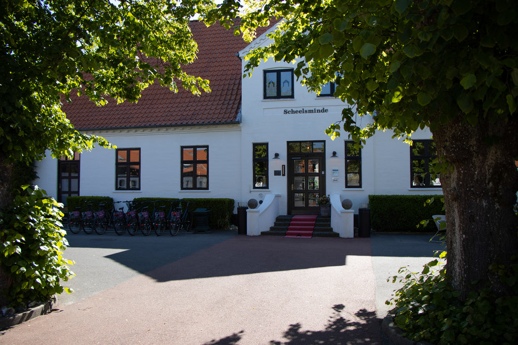 Historical white Danish manor, Hotel Scheelsminde