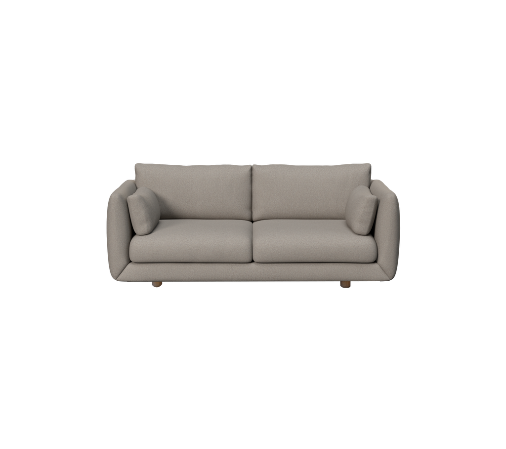 Light brown modern sofa with rounded cushions in a lounge setting.
