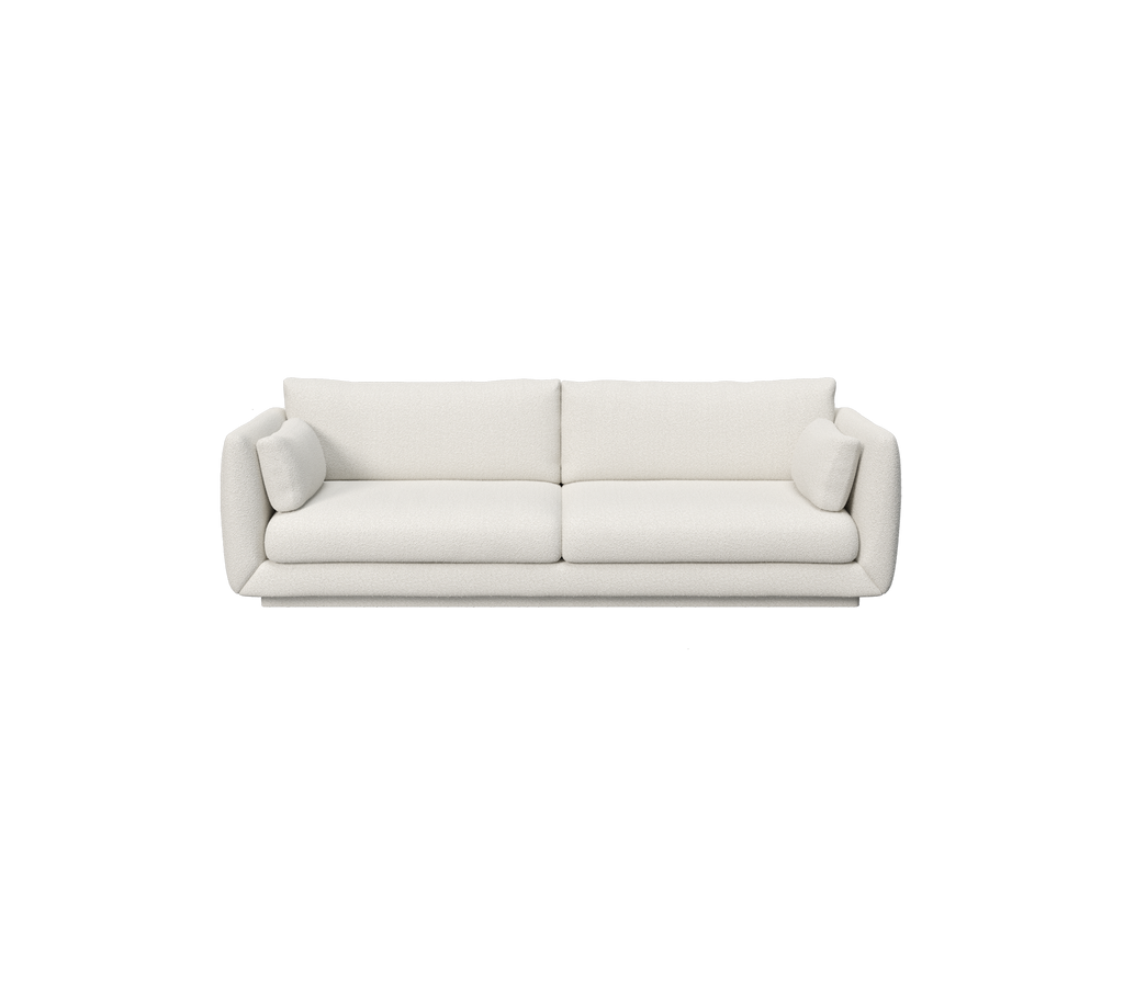 A modern white sofa with a minimalist design.