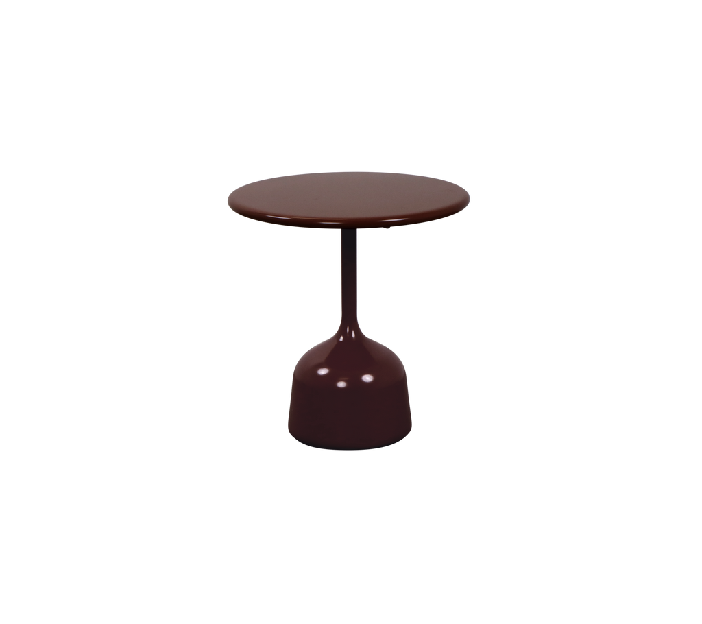 Burgundy table with a round top and a slender base.