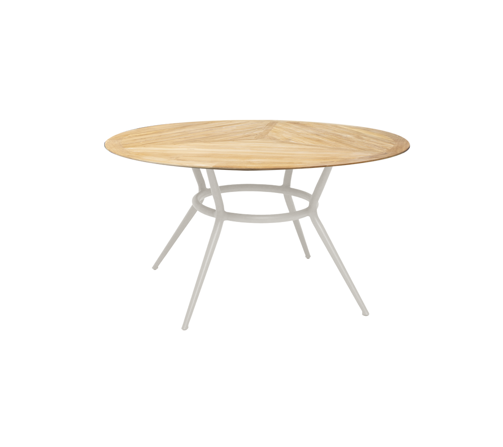 Modern round table with a light wood top and white legs.