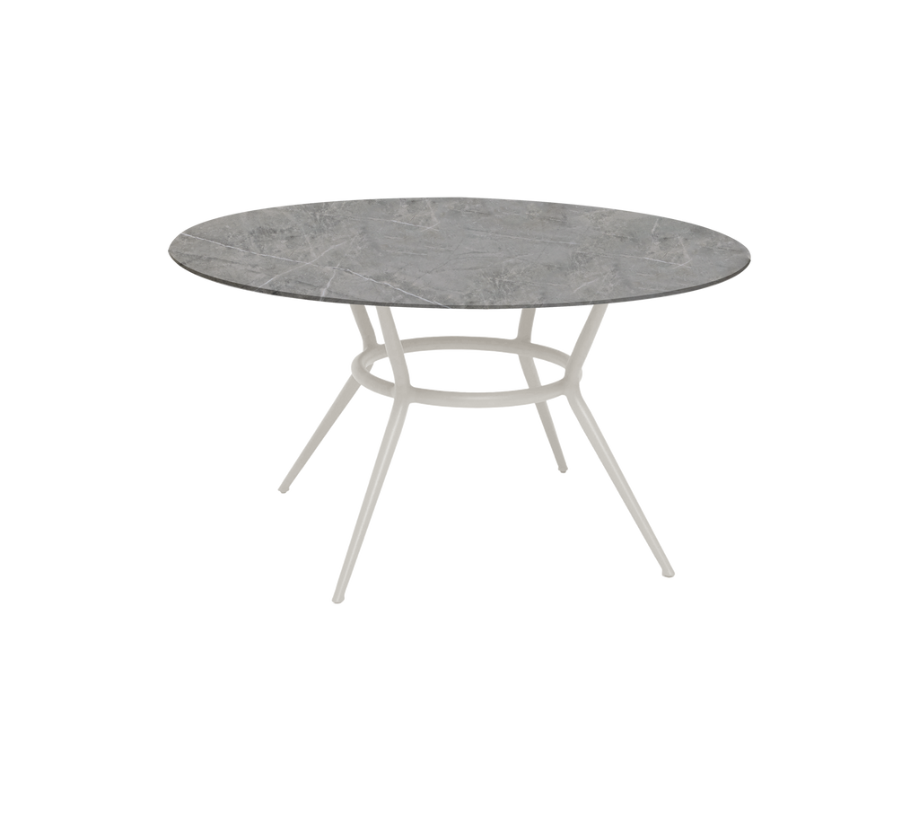 Modern round dark grey table with a sleek design.