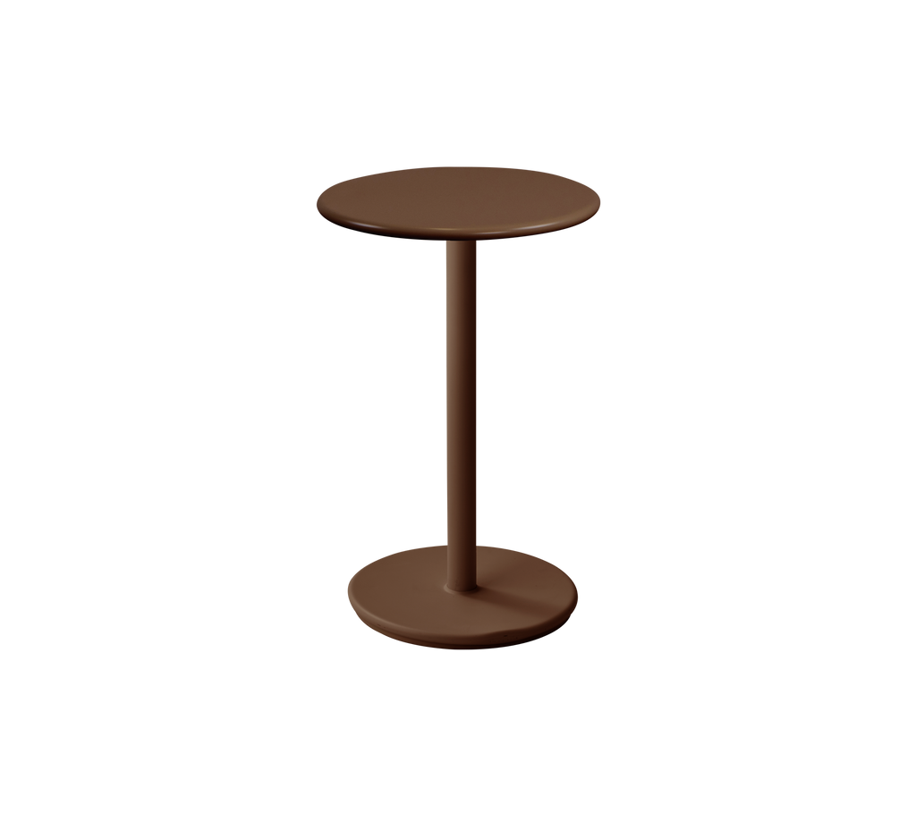 Modern round table in desert red color.