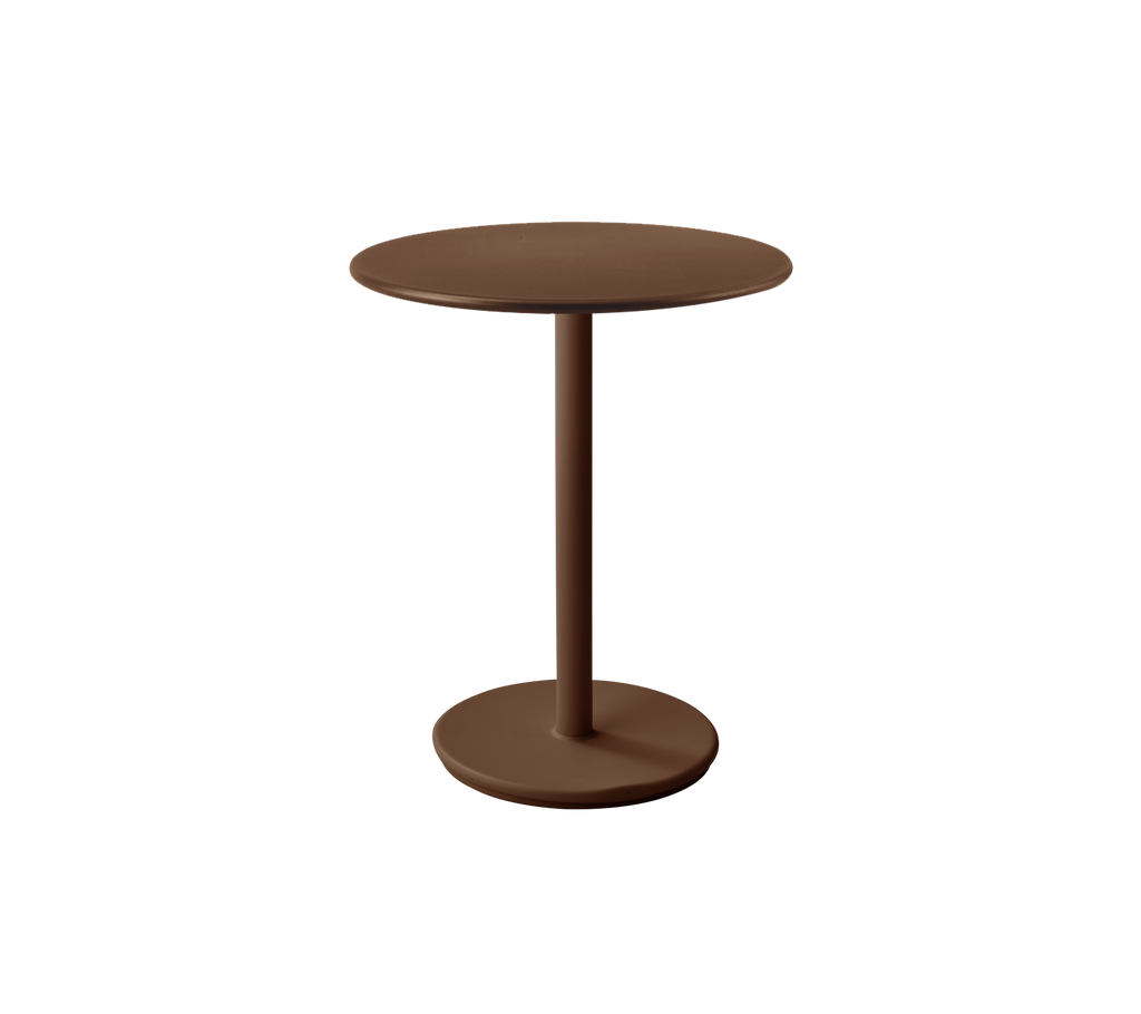 A modern Desert red table with a round top and a sleek pedestal base.