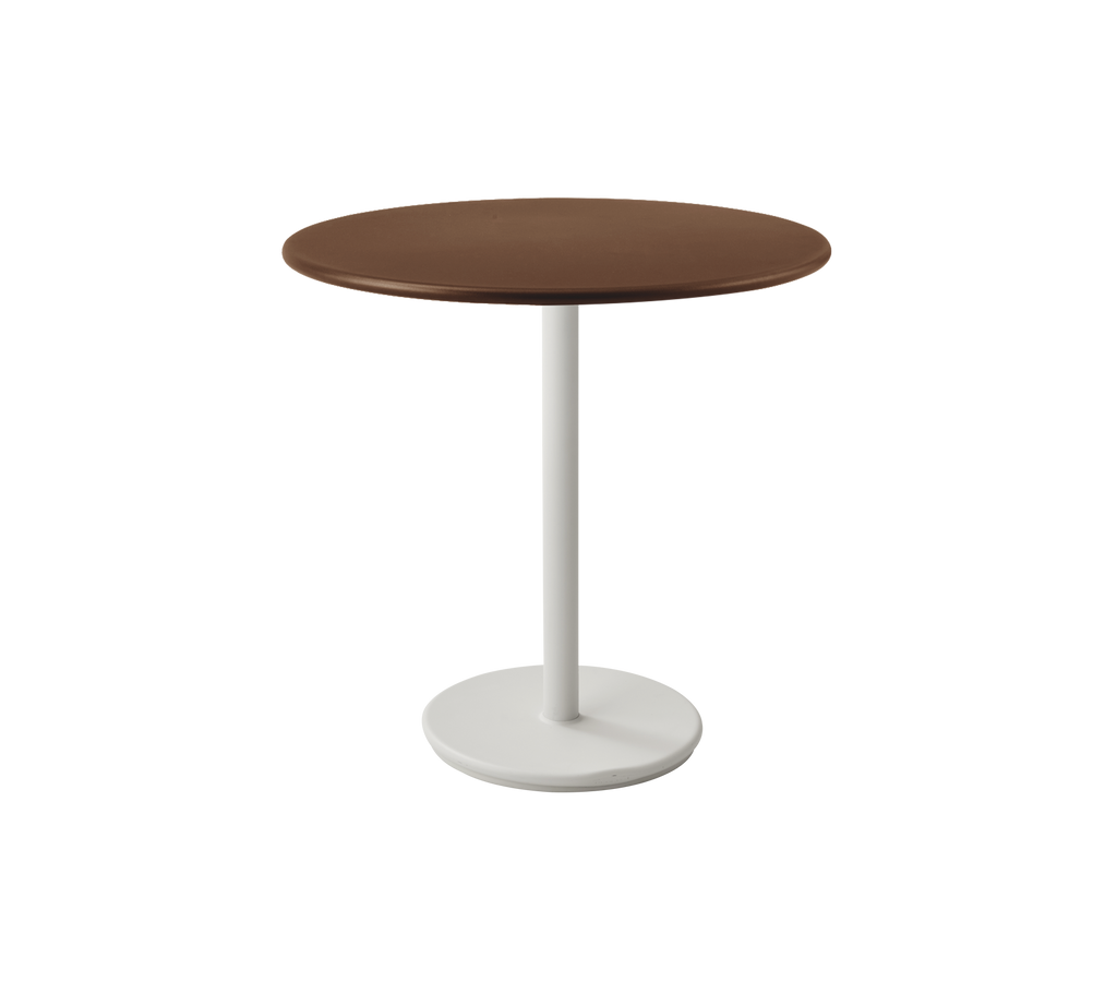 Round brown table with a white pedestal base.