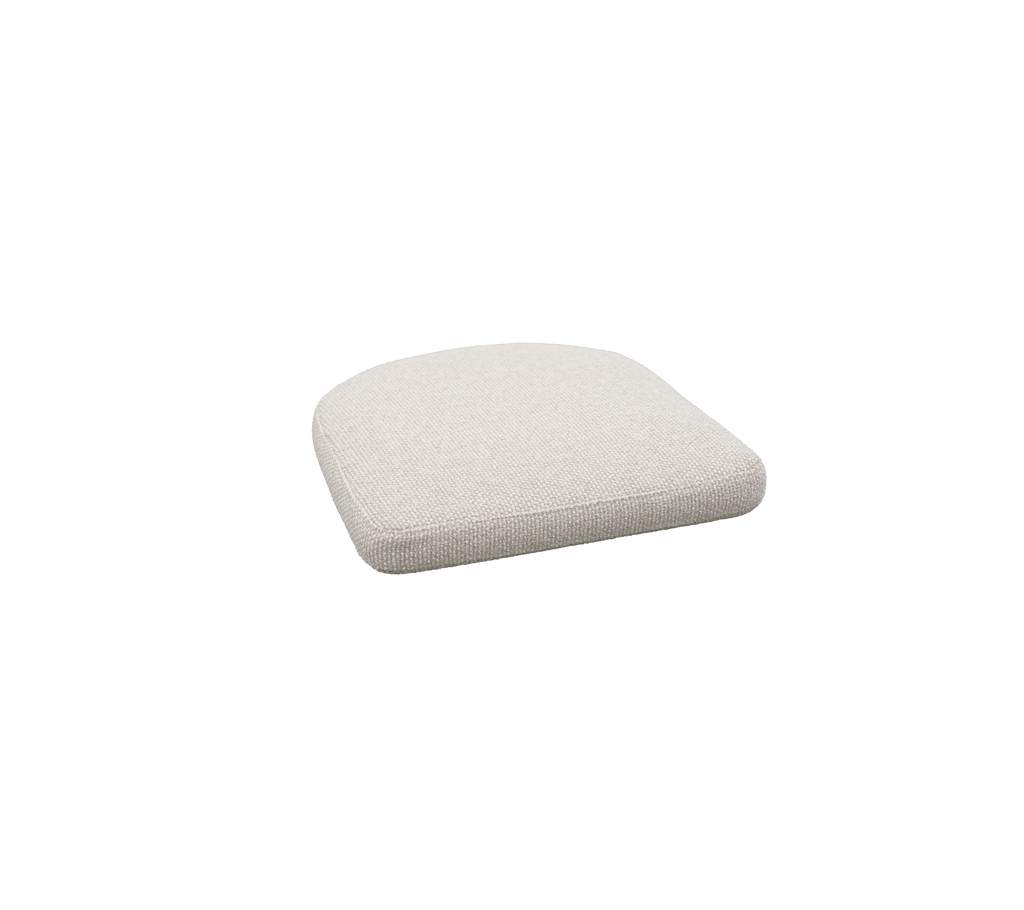 Desert sand cushion with a soft, curved shape.