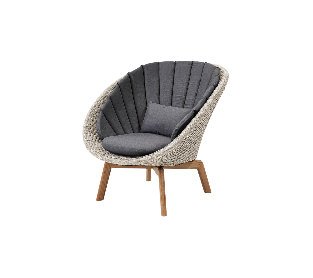 Modern grey chair with a curved design and wooden legs.