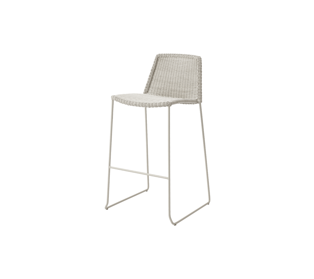 Sand bar stool with a sleek design and minimalist aesthetics.