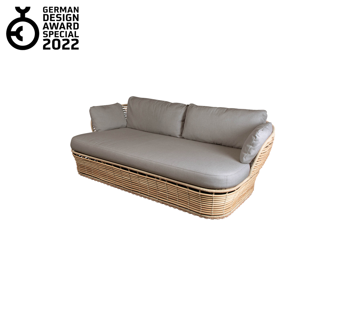 Contemporary sofa with a woven base and plush gray cushions, featuring a sleek design and elegant aesthetic. Awarded in 2022.
