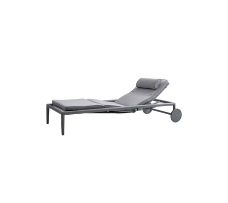 A grey adjustable lounge chair featuring a cushioned seat and a headrest, designed for relaxation and comfort.