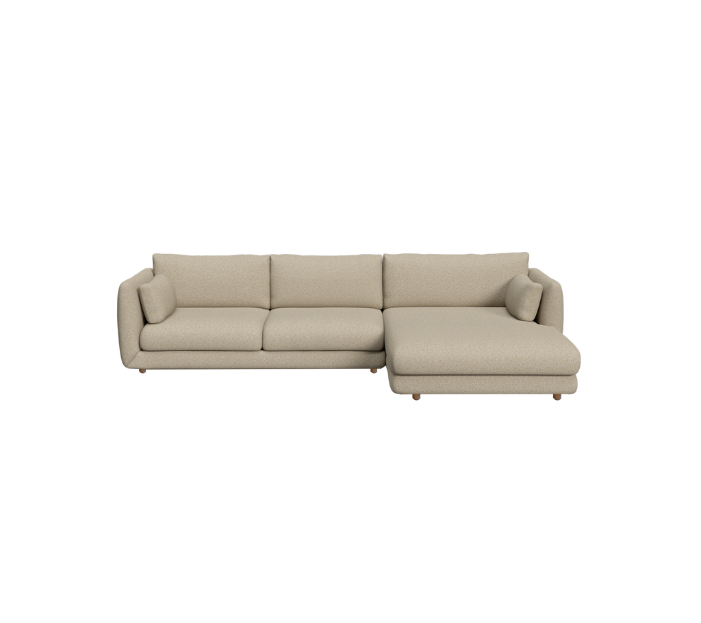 Modern beige sofa with a sectional design.
