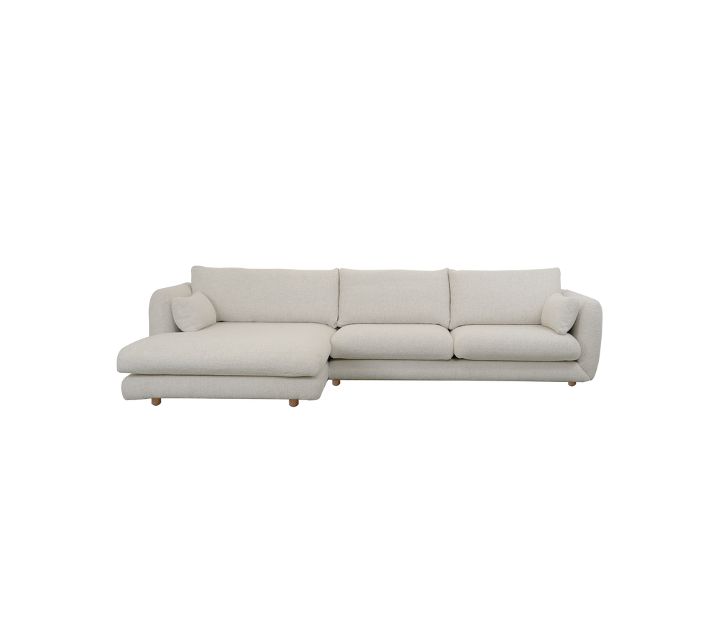 Modern sand-colored sofa with chaise lounge design.