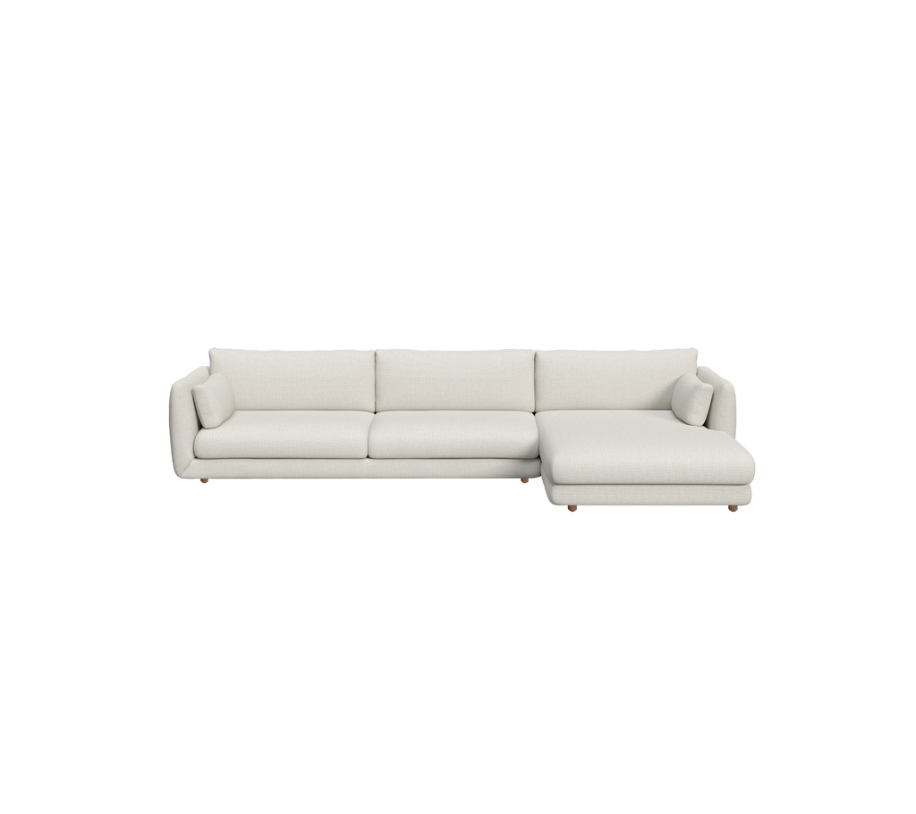 Modern sand sofa with a chaise lounge design.