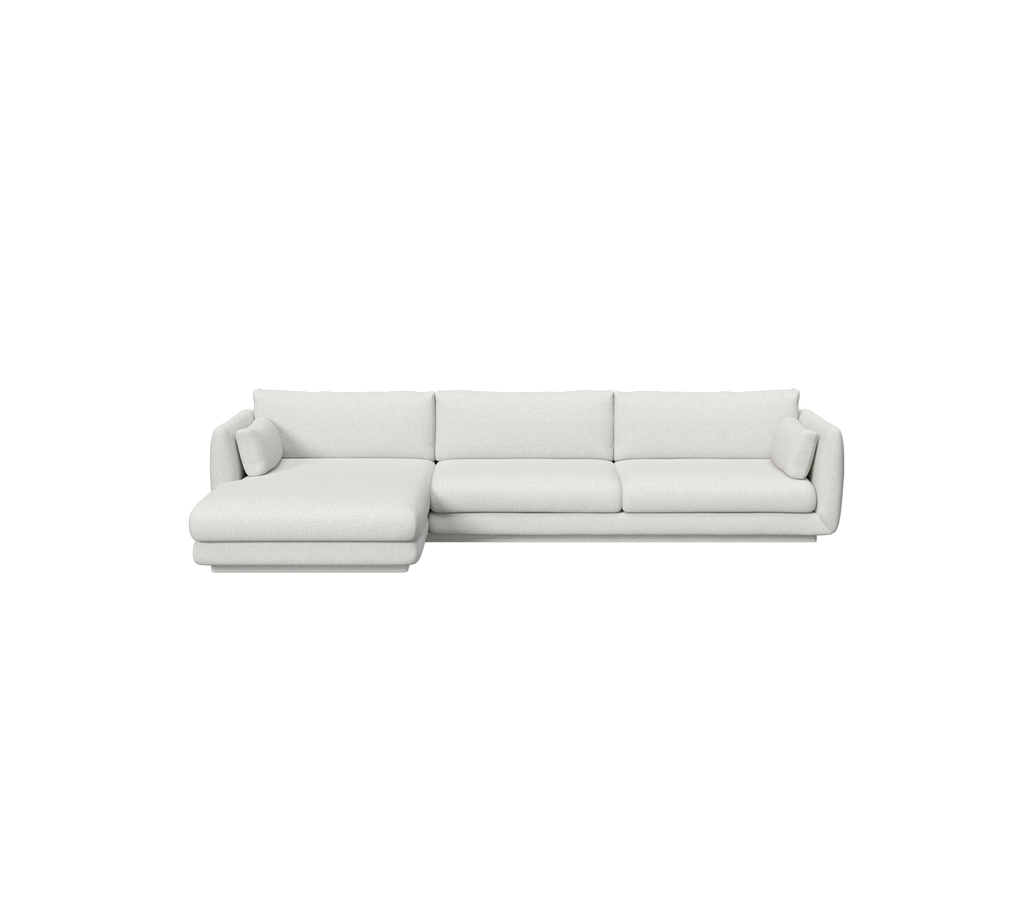 Light grey sectional sofa in a modern lounge setting.