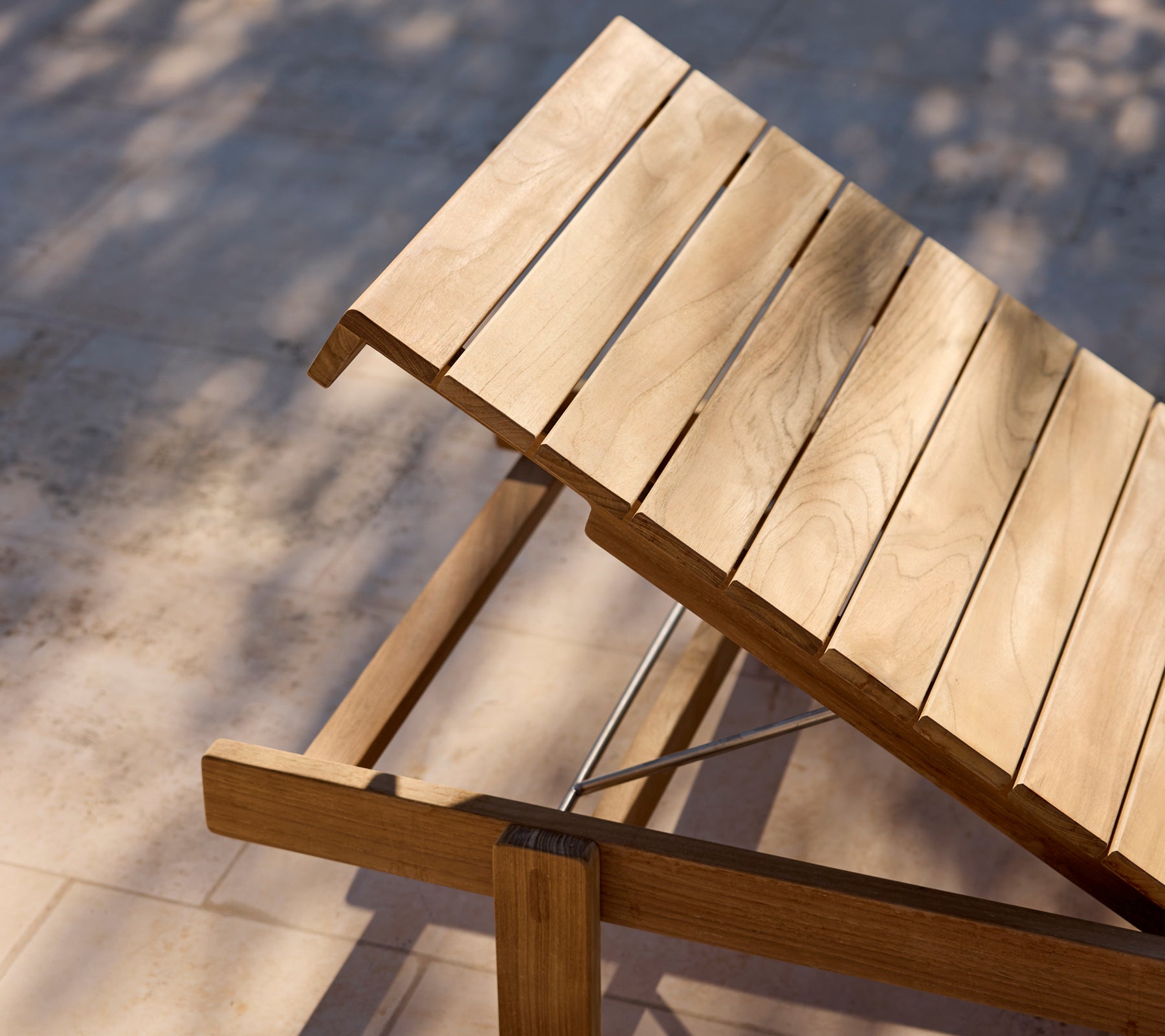 Close-up angled top of Vista sunbed showing wooden slats and frame